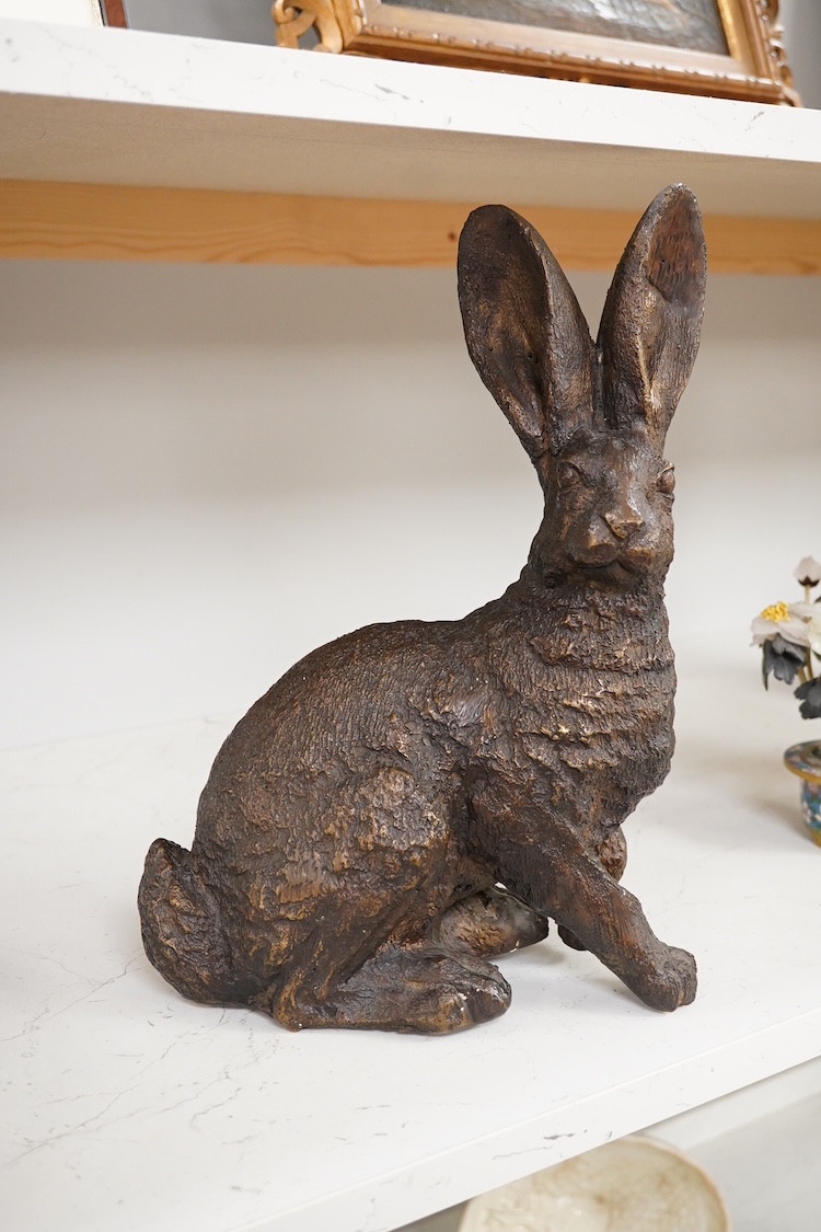 A patinated bronze figure of a hare, unsigned, 33.5cm high